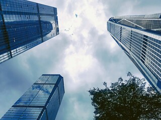 modern office building and skyline under blue sky