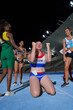 © Trevor Adeline/Caia Image - Excited female track and field athlete celebrating victory after race