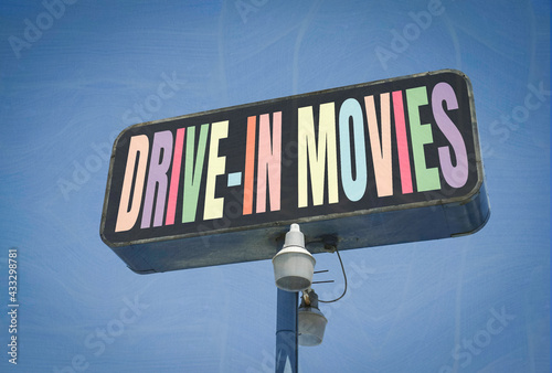 Aged and distressed photo of drive-in movies sign