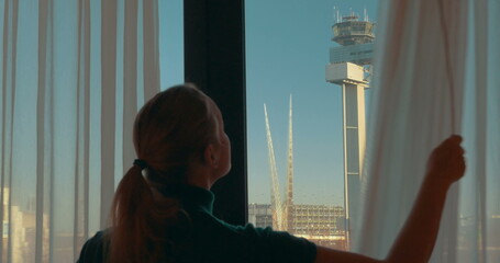 Woman Looking out the Window