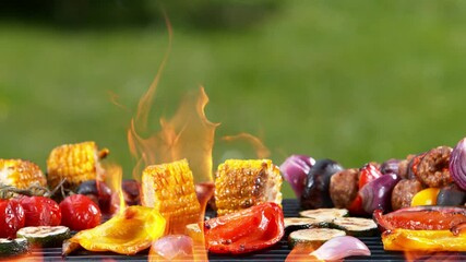 Wall Mural - Super slow motion of mix of meat and vegetable on grill grid. Filmed on high speed camera, 1000 fps