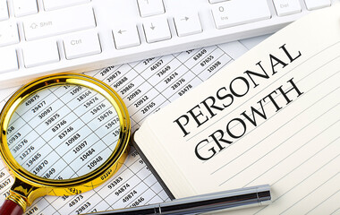 Poster - PERSONAL GROWTH text on notebook with chart, magnifier,keyboard and pen