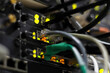 © Vadim Rodnev - Network connection technology with network switch router, ethernet cables and status LED to show working status of data center equipment in mobile telecommunications 5G central node