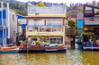 Colorful house boats floating on water in Sausalito, March 2016: San Francisco , USA