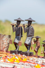 Wall Mural - Handmade souvenirs in a tourist stall on the street market near Inle Lake in Burma, Myanmar. Close up