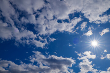 beautiful background with blue sky and sun