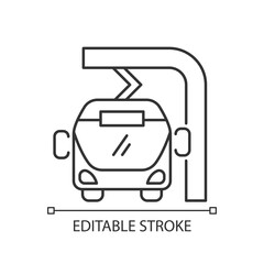 Electric bus en route charging linear icon. Filling up battery of tourism bus. Thin line customizable illustration. Contour symbol. Vector isolated outline drawing. Editable stroke