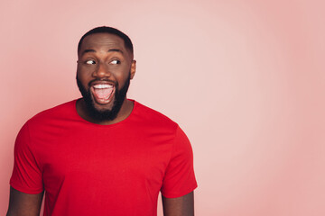 Wall Mural - Photo of dark skin guy unexpected good news isolated over pink background