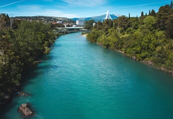 Canvas Print - View of Podgorica city with the Moraca river in Montenegro