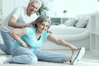 © aletia2011 - Active smiling senior couple exercising in gym