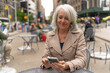 © blvdone - Mature caucasian woman in city