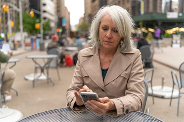 Poster - Mature caucasian woman in city