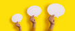 bubble speech layout in hand over yellow background, panoramic mock-up