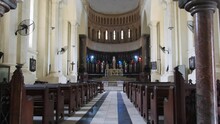 Interior Of Anglican Cathedral Christ Church With Wooden Prayer Bench And Altar. Stone Town, Zanzibar. Inside View On Ancient Slavery Museum, Famous Historic Place. UNESCO. Tanzania, Africa