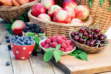 Wall Mural - Berries in healty diet for strong immunity, organic fruits on table 