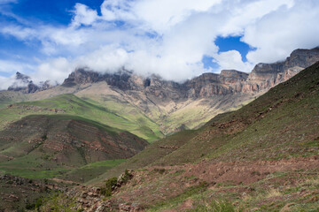 landscape mountain peaks in the clouds