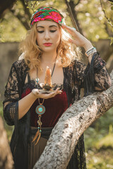 Gypsy soul... Boho woman with Tarot cards, candles and magic ball at field, lifestyle, predicting, ideas for costume on Halloween