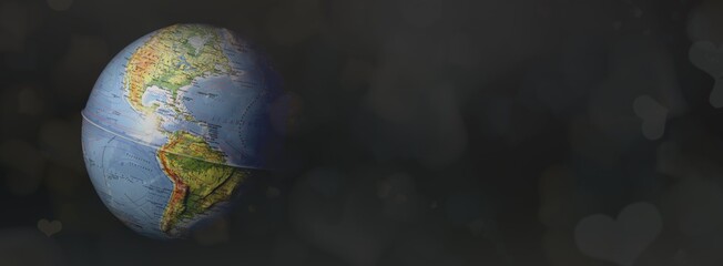 blue planet earth in black space. postcard. bokeh hearts effect