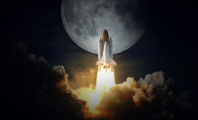 space shuttle takes off to the moon. elements of this image furnished by nasa.