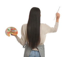 Wall Mural - Young woman drawing with brush on white background, back view