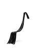Detail shot of black whip with long fringe and loop on twisted handle. Leather tool for erotic games is isolated on the white background. 