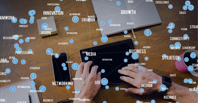 Composition of network of digital icons and text over man using tablet in background