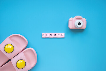 Wall Mural - Summer word on a blue background.