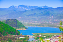 Lake And Ceahlau Mountain Seen From Piatra Neamt City, Romania
