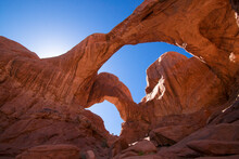 "Double Arch" With Blue Sky And Orange Sandstone, Archs National Park, Moab, Utah