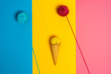 Colorful Woolen Thread Balls In Natural Crunchy Cone Representing Various Gelato On Three Color Background