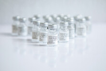 Close-up Of Some Vials With The Coronavirus Vaccine On A White BackgroundClose-up Of Some Vials With The Coronavirus Vaccine On A White Background