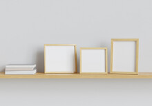 Three Photo Mockup Frames And Books On The Shelf. Clipping Path Included. 3D Render. 3D Illustration.