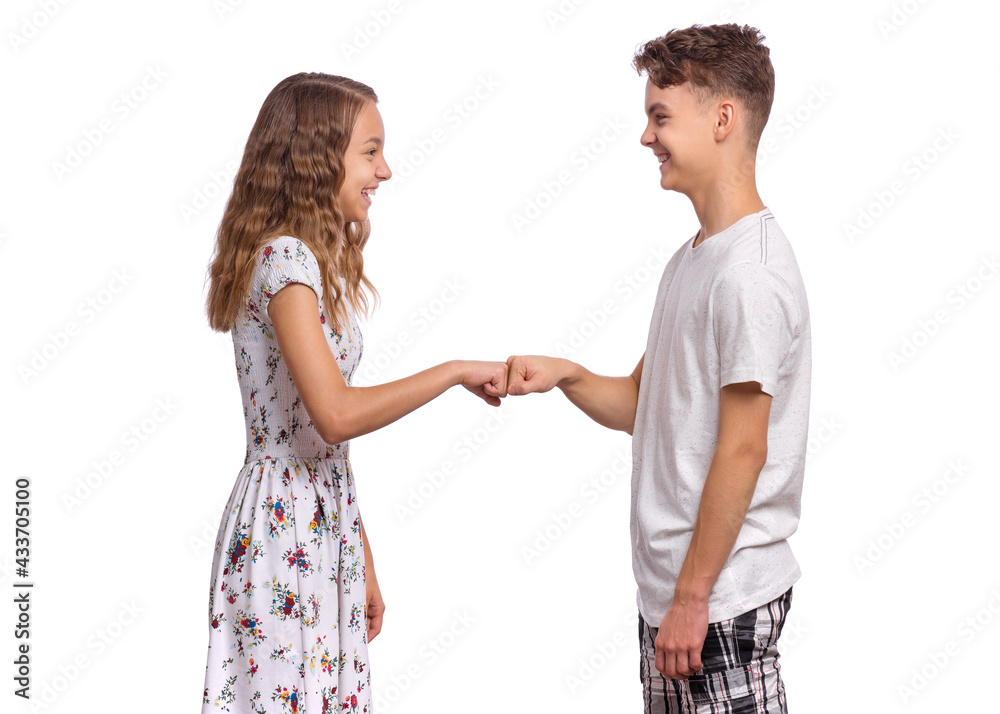 Portrait of happy teen boy and girl handshaking. Young attractive ...