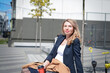 © bisonov - Business woman with a cup of coffee
