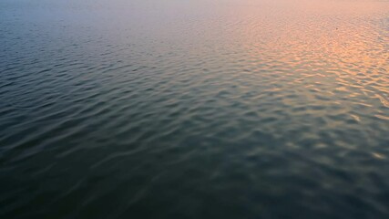 Poster - 4K time lapse video of Evening Light on The Water at Kwan Phayao Lake, Thailand.