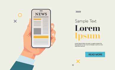 businessman hand holding mobile phone reading news or articles on smartphone screen