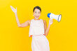 © siraphol - Portrait beautiful young asian woman smile with megaphone