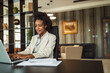 © bnenin - Woman using laptop, typing on the keyboard.