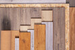 Laminate floor and cork roll on wood osb background texture. Wooden laminate floor and chipboard
