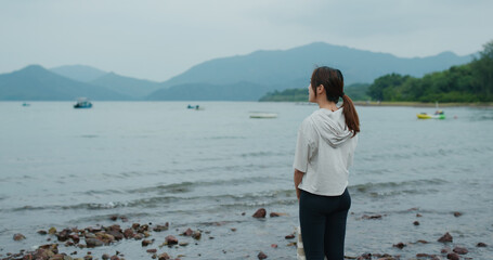 Wall Mural - Woman look at the sea