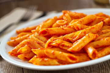 Sticker - Pasta with Tomato Sauce on a plate. High quality photo.