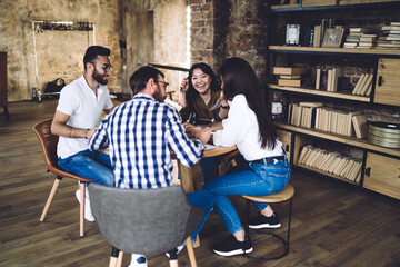 Sticker - Group of cheerful colleagues talking in office