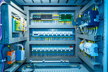 Switchboard Equipment. Shield For Enterprise Automation. Concept - Equipment For Automation Of Equipment At Enterprise. Panel With Wires And Switches At Enterprise. Automation Of Production.
