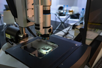 Poster - Modern electron microscope close-up. Microscope in the laboratory. Concept - equipment for scientific research. Fragment of a microscope. Enlarged image acquisition equipment.