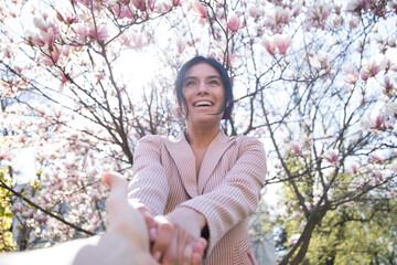 Wall Mural - Close-up portrait of beautiful smiling female relaxing in the nature. Love photo. Sensual. 