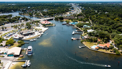 Fototapete - Located along the Gulf of Mexico about 35 miles northwest of Tampa, Port Richey's riverfront landscape blends nature, beaches and terrific shopping with restaurants, culture and business – all wit