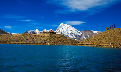 Wall Mural - Gurudongmar Lake, Sikkim, India and it's way from Lachen, North Sikkim. A holy lake never fully freezes. It is said that Goutam Buddha drinks water from this lake.