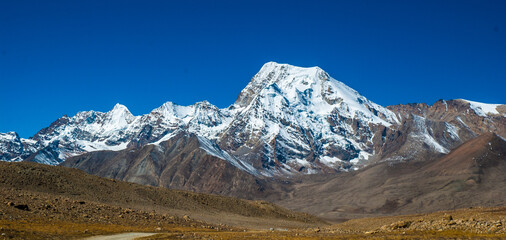 Wall Mural - Gurudongmar Lake, Sikkim, India and it's way from Lachen, North Sikkim. A holy lake never fully freezes. It is said that Goutam Buddha drinks water from this lake.