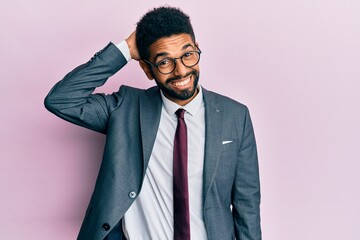 Sticker - Handsome hispanic business man with beard wearing business suit and tie confuse and wonder about question. uncertain with doubt, thinking with hand on head. pensive concept.