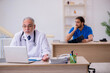 © Elnur - Two doctors working in the clinic